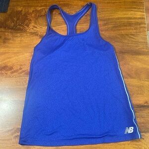 EUC New Balance racer back tank in royal blue.